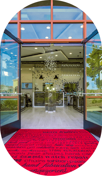 Bravo Jewellers store entrance with glass doors and red welcome mat