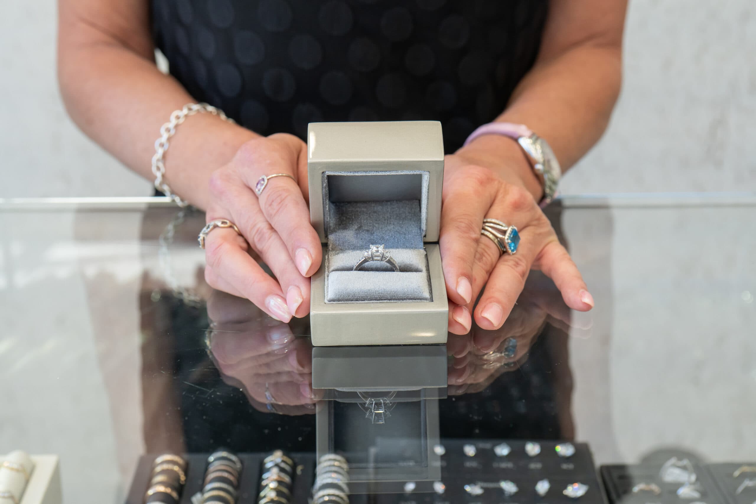 Alex Petrov examining jewelry at the workbench